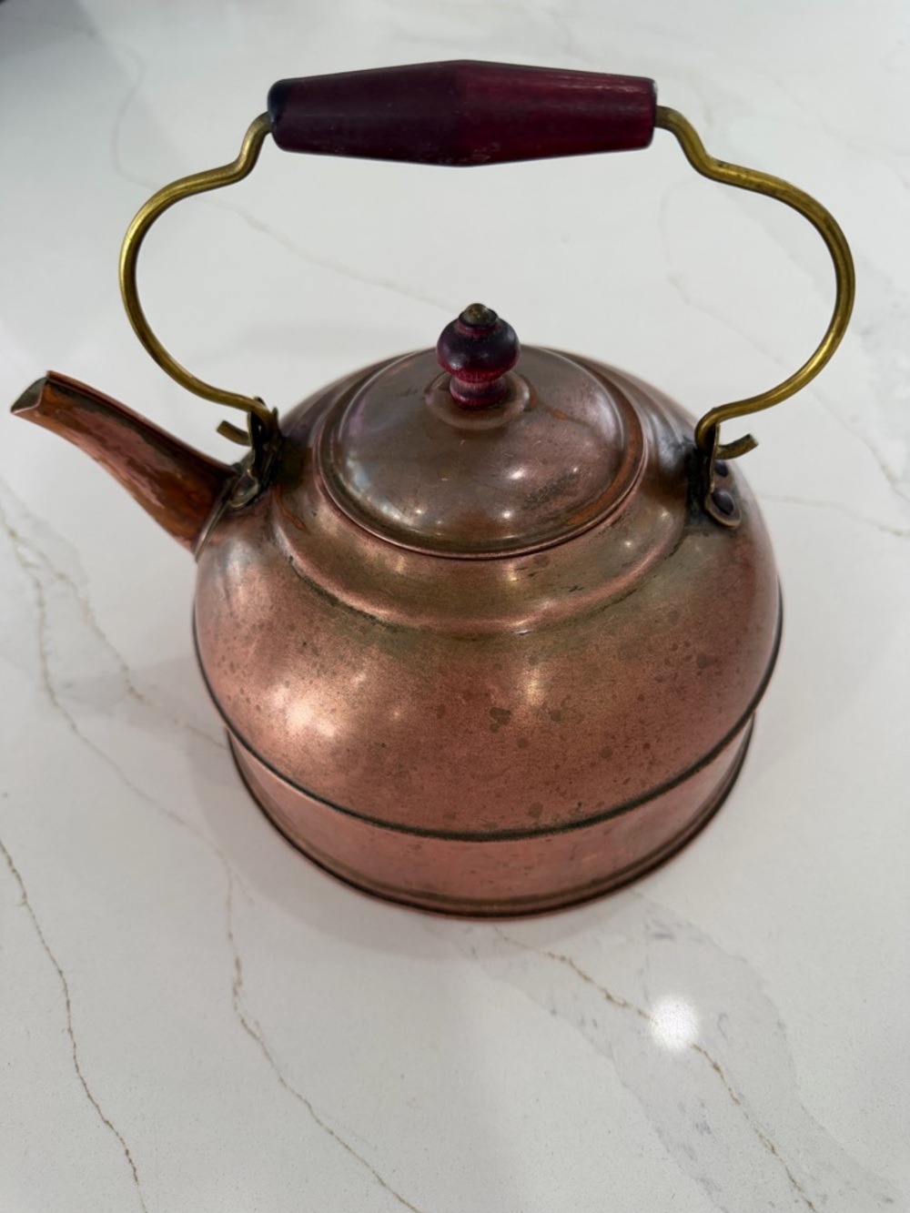 Revere Ware  Copper Teapot with Red Wood Handle Accent and brass holder.